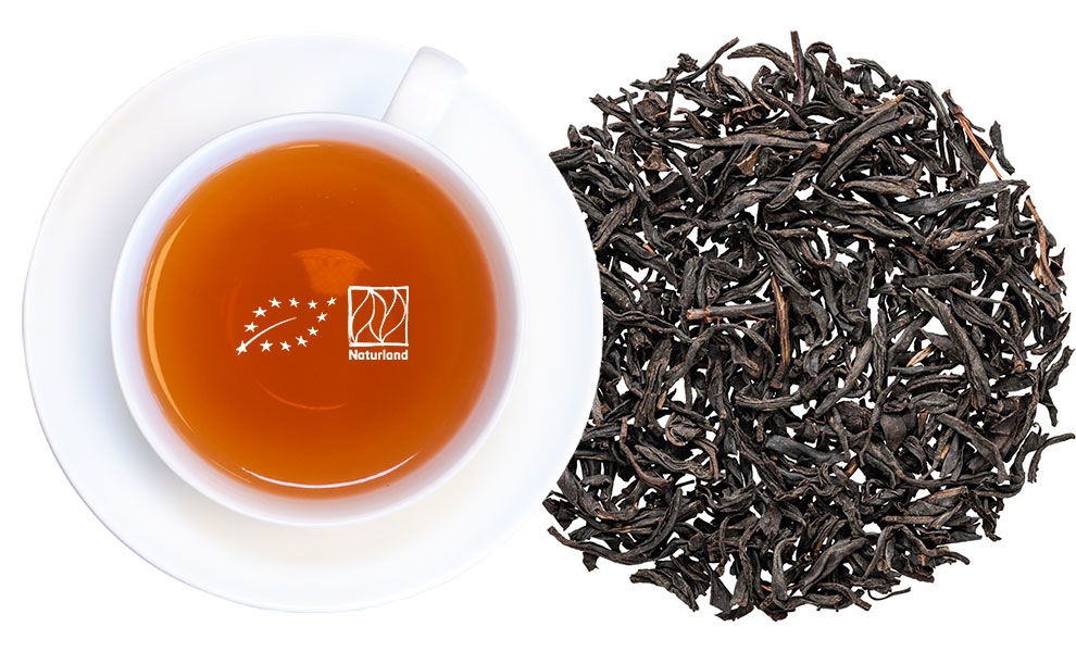 Weiße Tasse Schwarztee mit losen Teeblättern, Earl Grey, Tee, Lose Blätter, Schwarzer Tee, Teeblatt?
