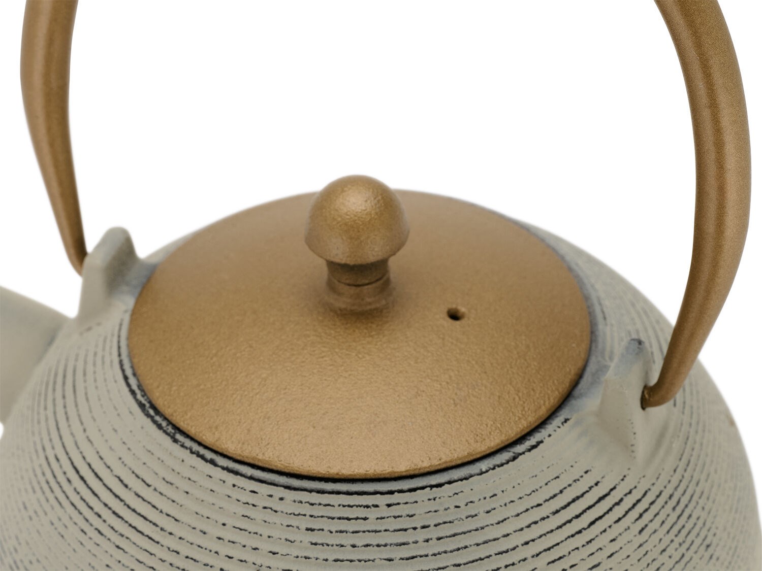 Cast iron teapot with golden lid and handle