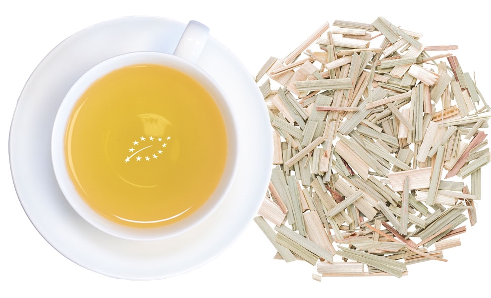 Weiße Tasse Lemongras-Tee neben getrocknetem Zitronengras, tee, kopp, kräutertee,  lose-blatt,  tular?