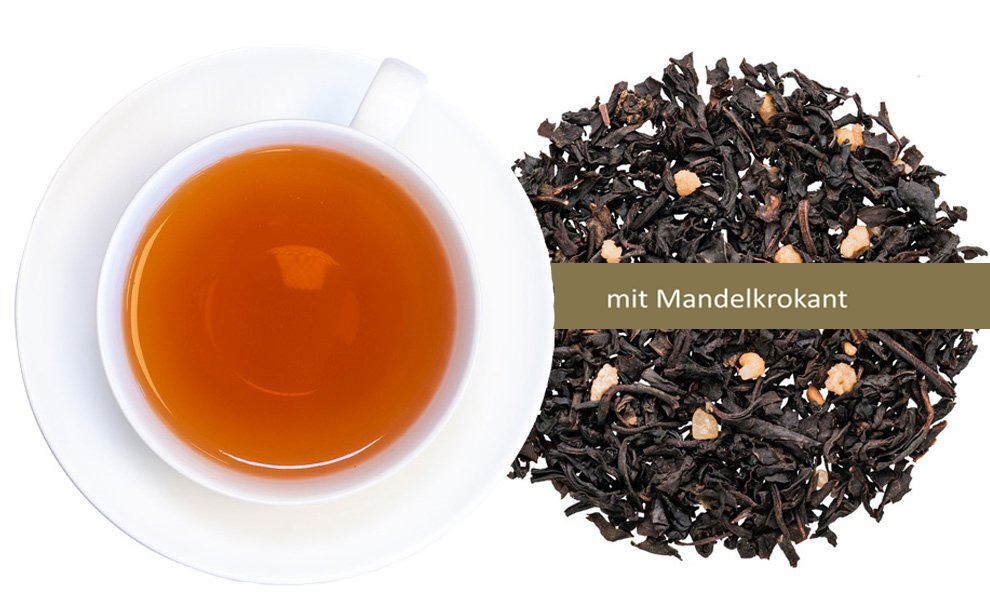 Tasse schwarzer Tee mit Mandelkrokant-Tee lose daneben, Tee, Schwarztee, Mandellikör, Teeblätter, Kanne/Becher