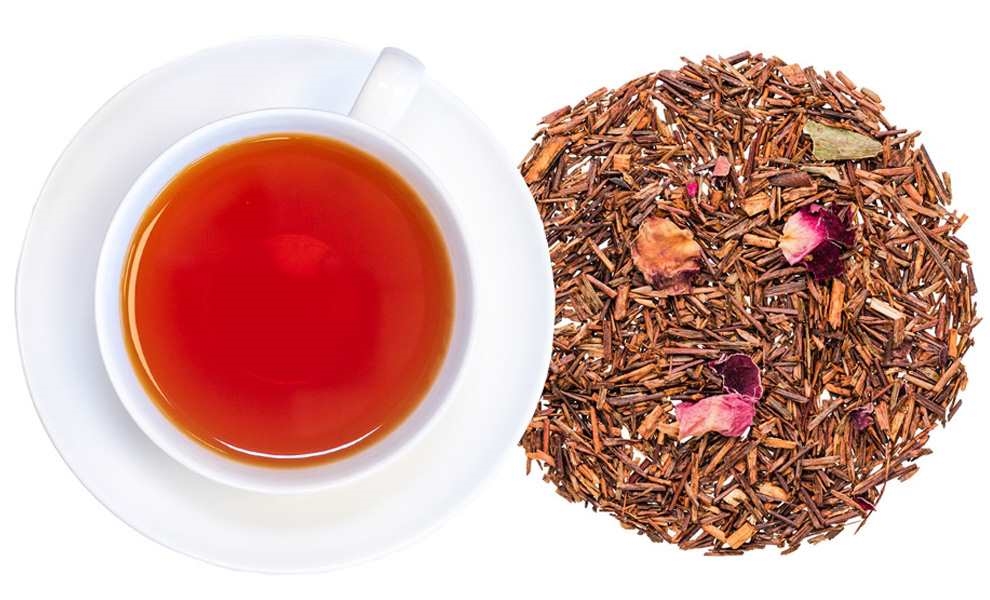 Weiße Tasse mit Rooibostee und losem Rooibos-Tee, tee, tee-beutel, Kräutertee, Lose-Blatt, roter Tee