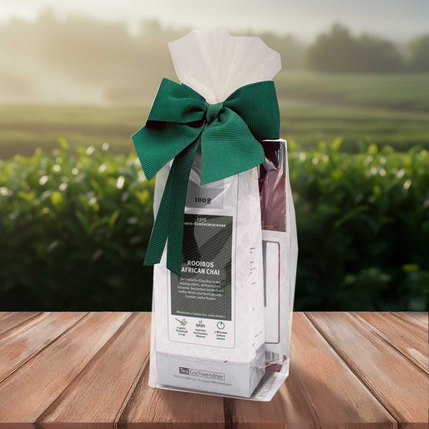 Coffret thé Rooibos African Chai sur table en bois