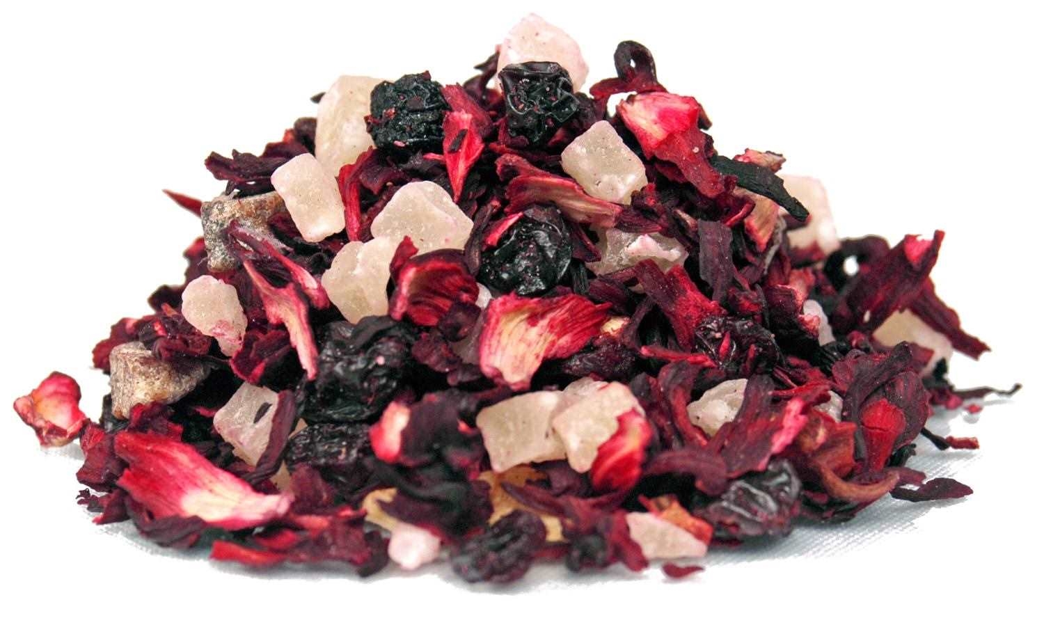 Nahaufnahme von Früchtetee mit Hibiskus und Beeren, Hagebuttenrose, Rosenblätter, Blütenblätter, Blütenmischung, Kristalle