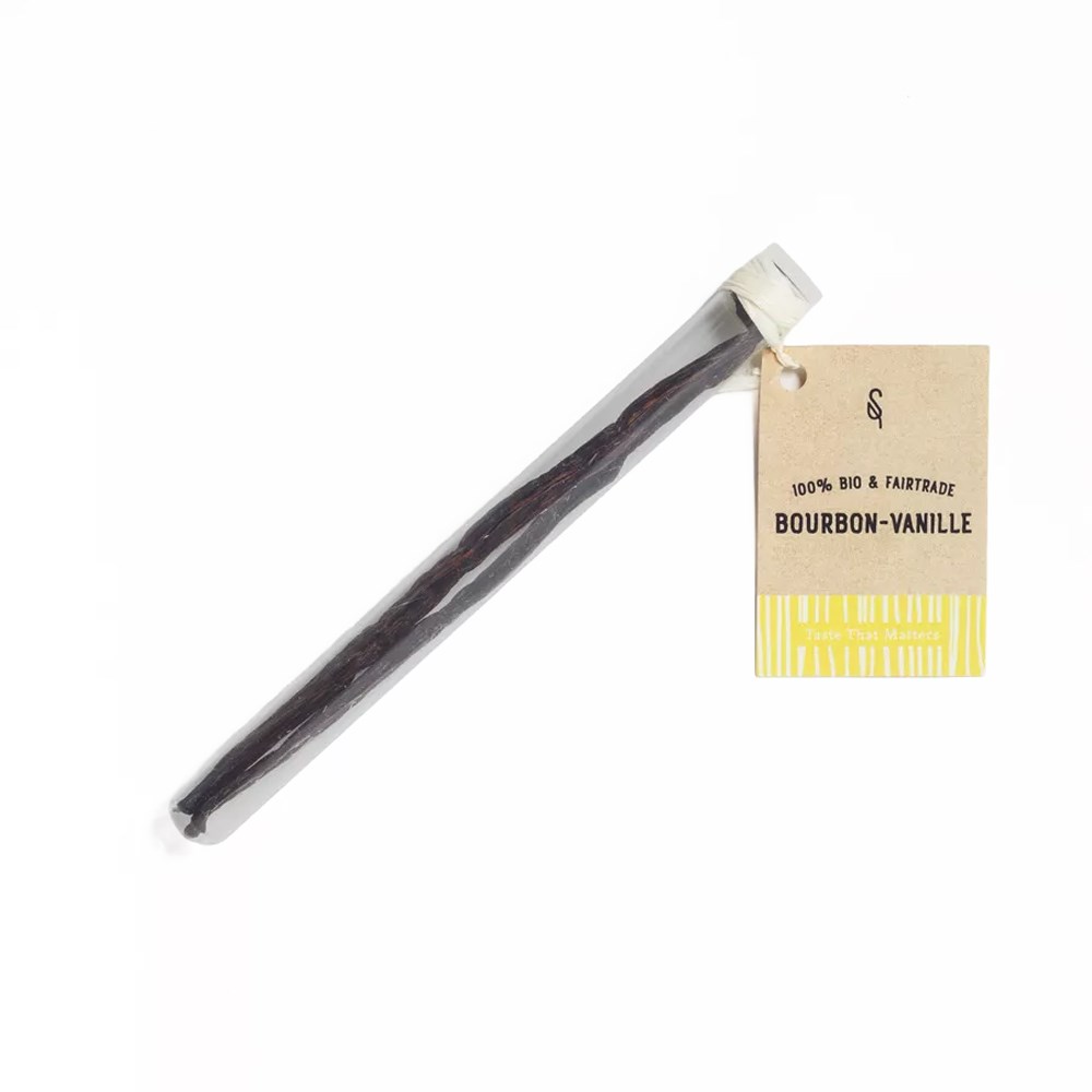 Gousse de vanille Bourbon bio unique dans un tube en verre scellé avec étiquette commerce équitable