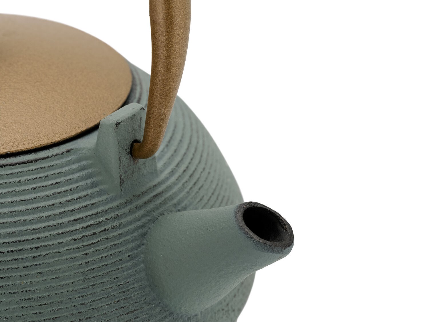 Cast iron teapot with golden handle on white background