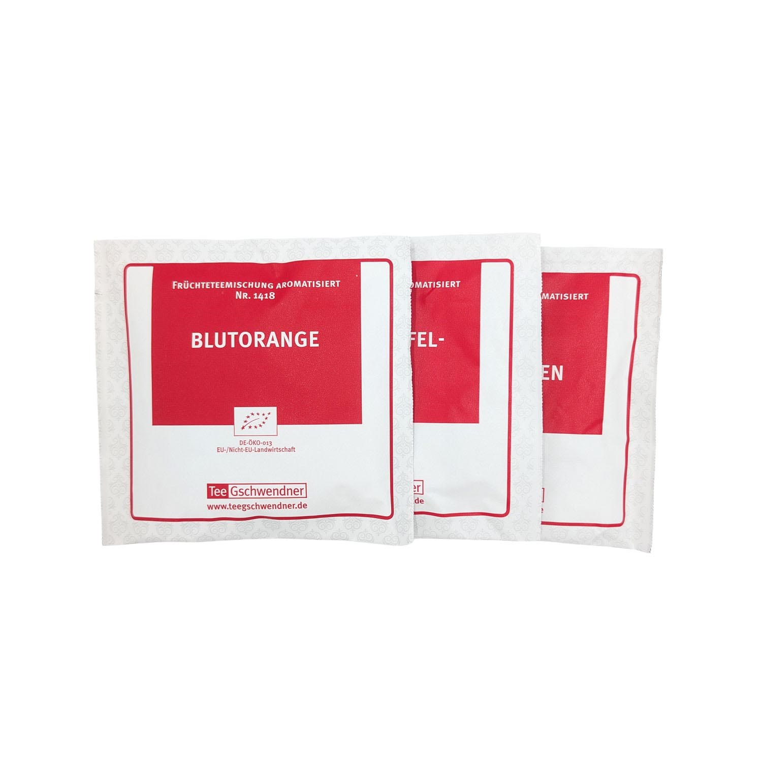 Drei einzeln verpackte Tee Gschwendner Früchtetee-Beutel, vorne Sorte Blutorange, aromatisierte Bio-Früchteteemischung, tee-geschwender, blutorange, früchtetee, teesache, aufgussbeutel