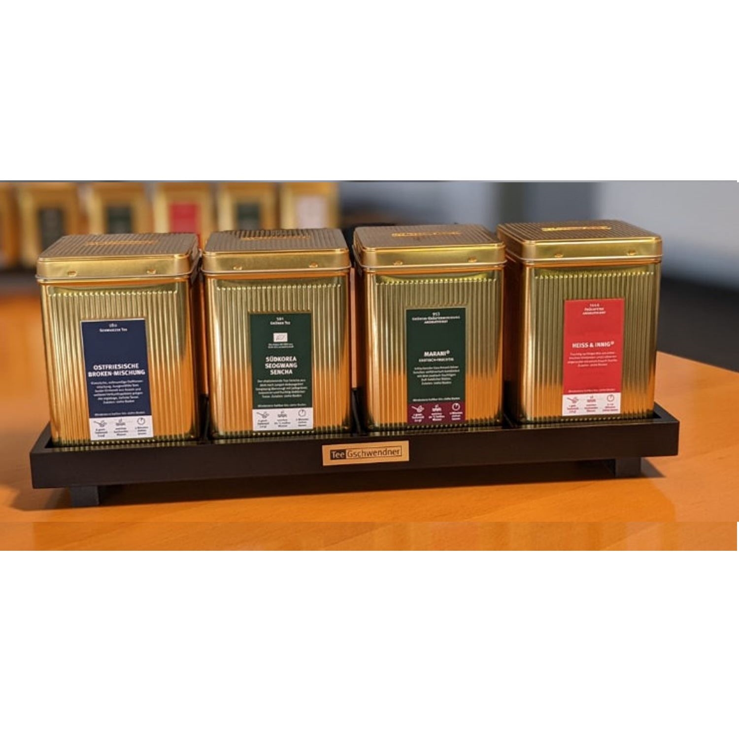 Vier goldene Tee Gschwendner Dosen im Display-Set,  Tee-Set, Sealing tins, Gold tins, Tea assortment, Organiser tray