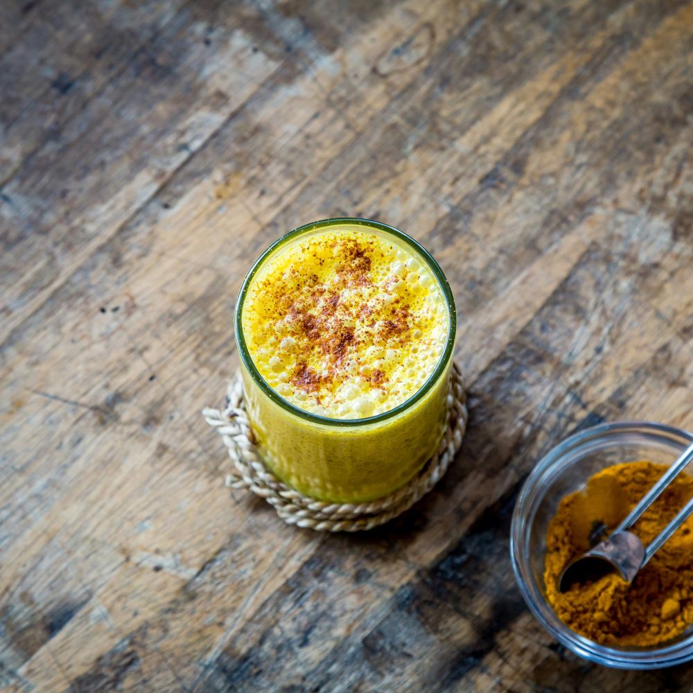 Fresh golden milk with turmeric and spices