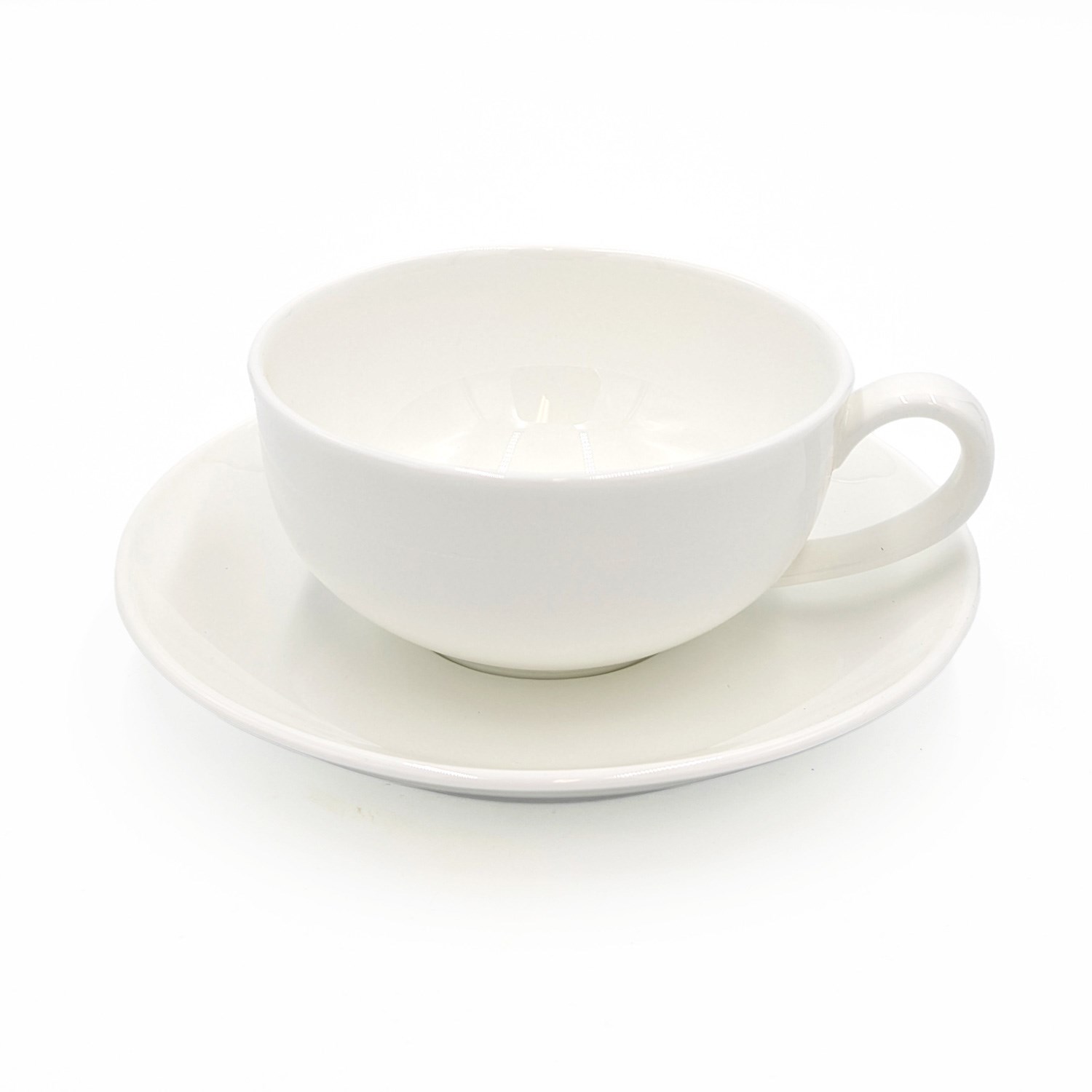 Product image of a plain white porcelain cup with matching saucer on a white background