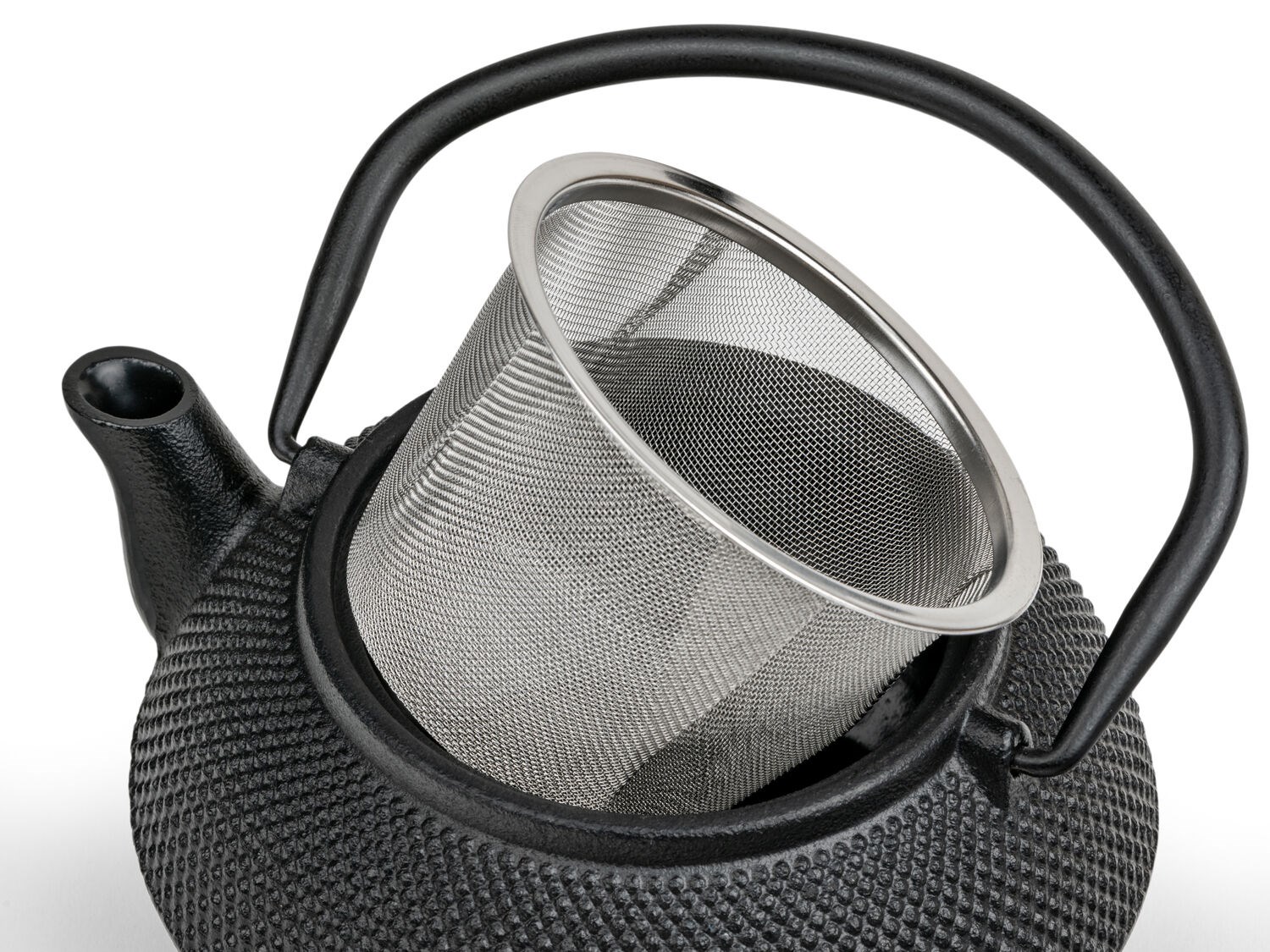 Black cast iron teapot with removable metal infuser