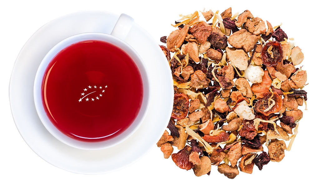 Rote Tasse Früchtetee neben loser Früchteteemischung, Kräutertee, Hagebuttentee, Früchtetee, Teetasse, Teekanne