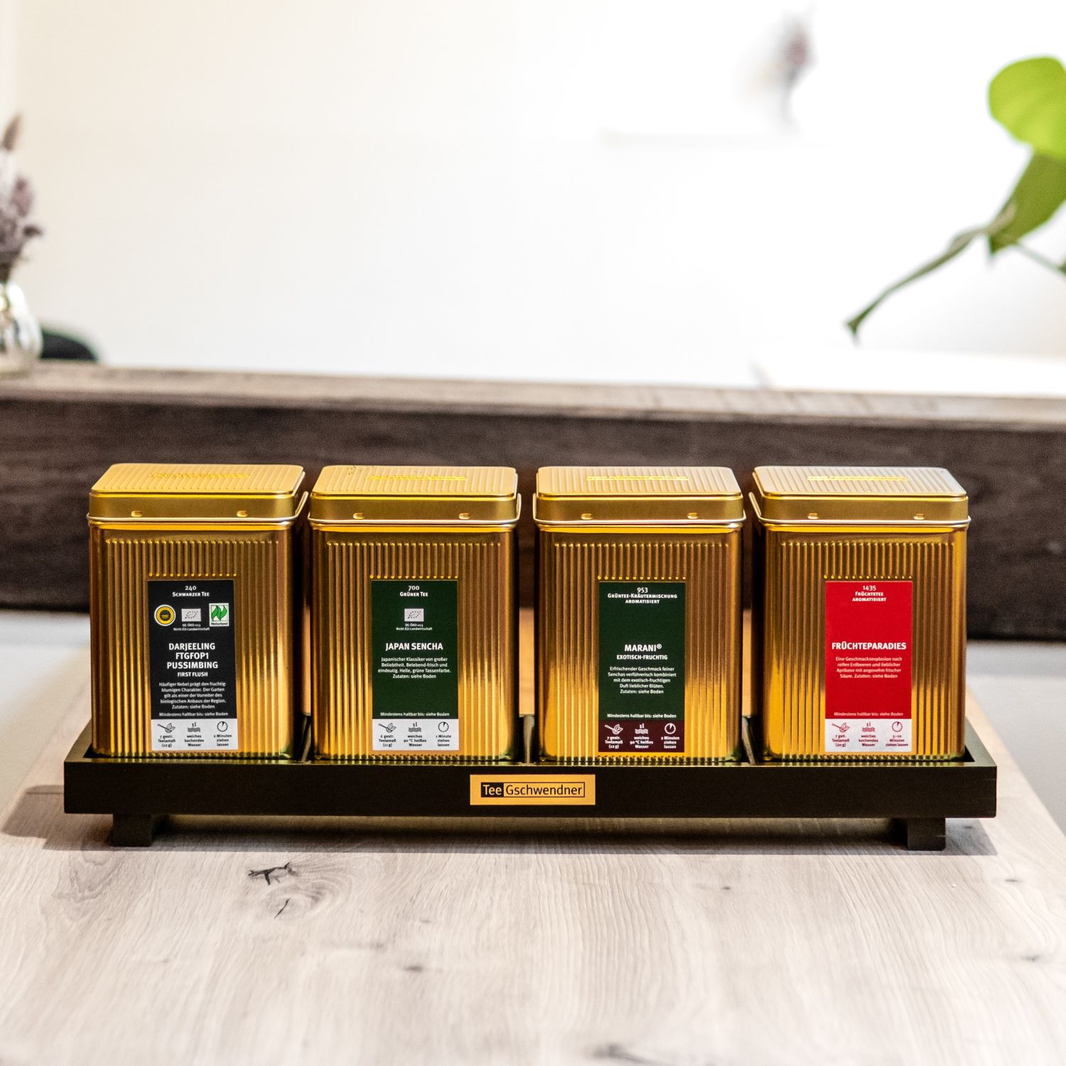 Vier goldene Tee Gschwendner Dosen im Set