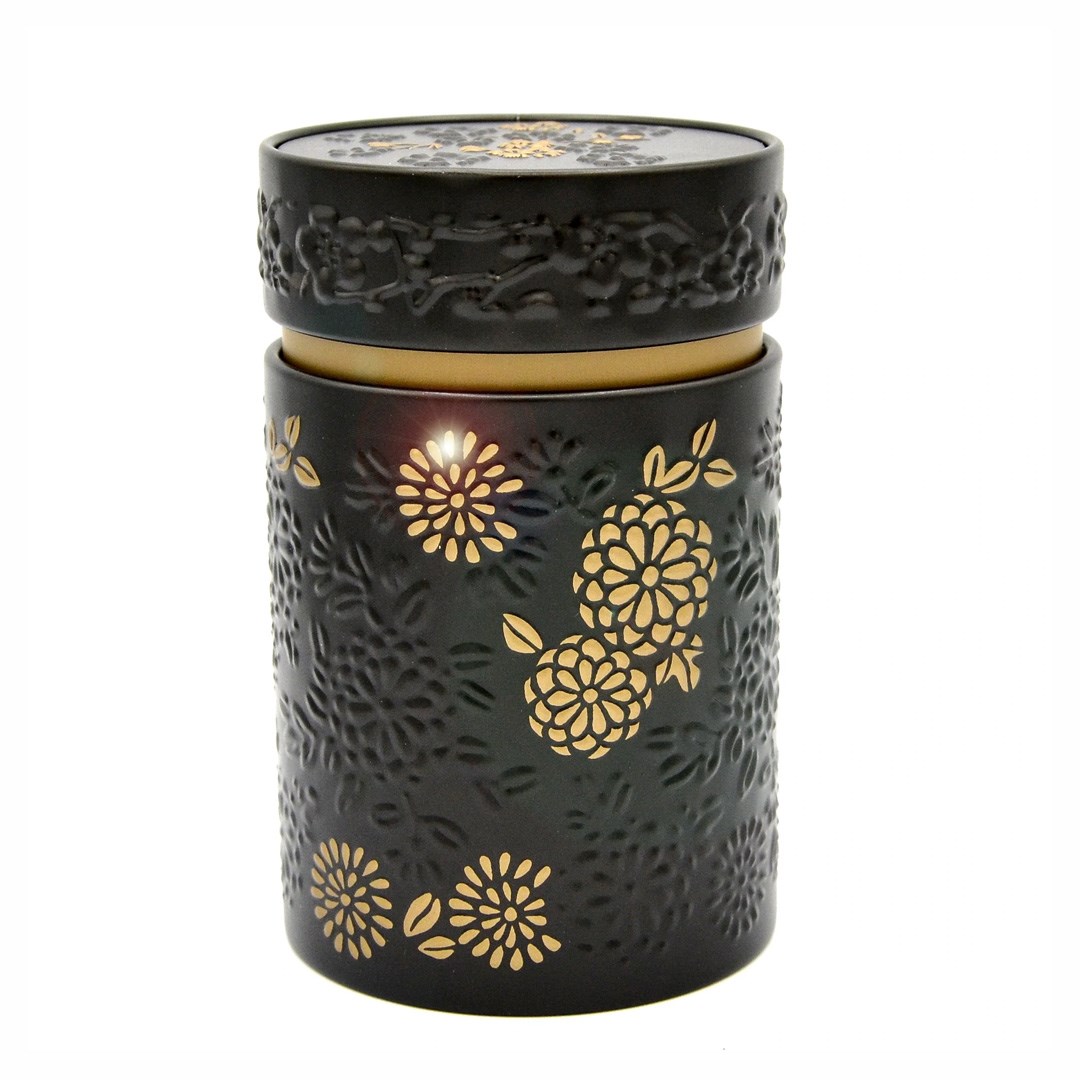Runde schwarze Teedose mit goldenen Blumenmustern, Kerze, Gläser, Metall, Schwarz, Goldenes Muster