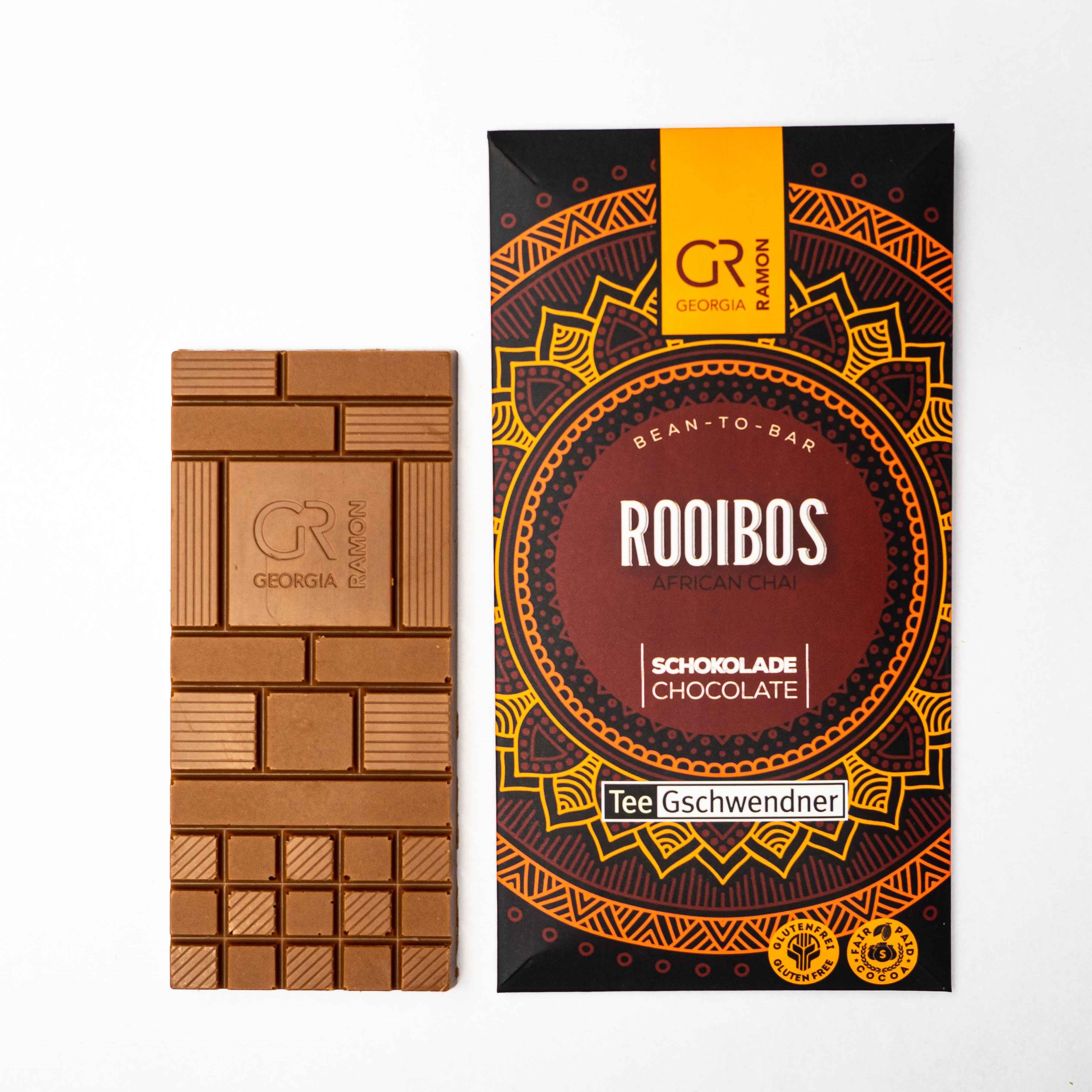 Georgia Ramon Rooibos Schokoladentafel neben Verpackung, Schokolade, Tafel, Rooibos, Afrikanischer Tee, Beutel?