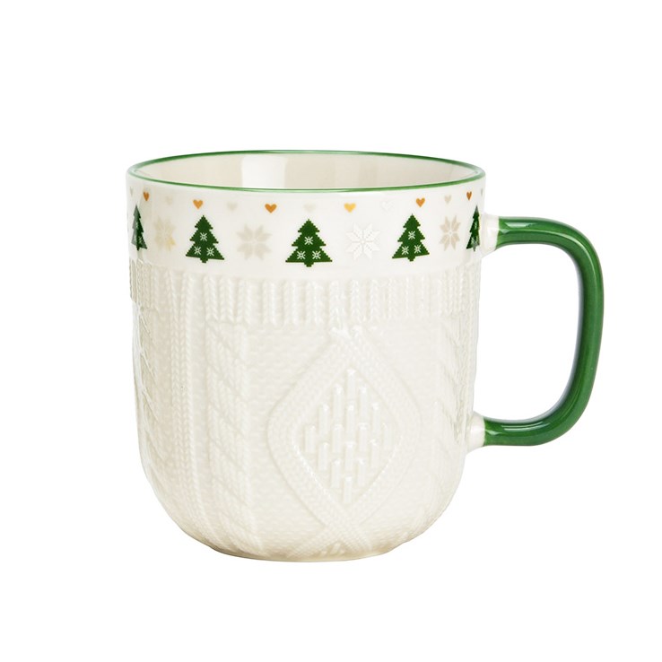 Ceramic mug with Christmas tree design and green handle