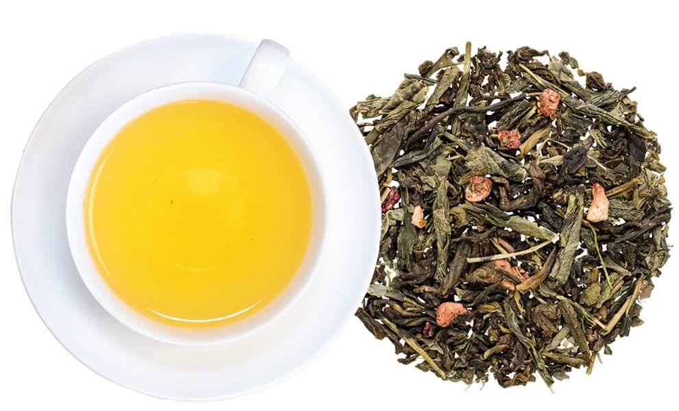 Tasse grüner Tee mit losem Früchtetee daneben, Grüner Tee, Teeblatt, Teeblatt, Lose Tee, Aufguss