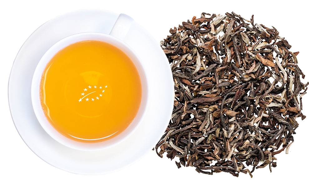 Weiße Teetasse mit losem Blatttee, tee, Tee-Tasse, Küche, Teesorte, Blätter-Tee