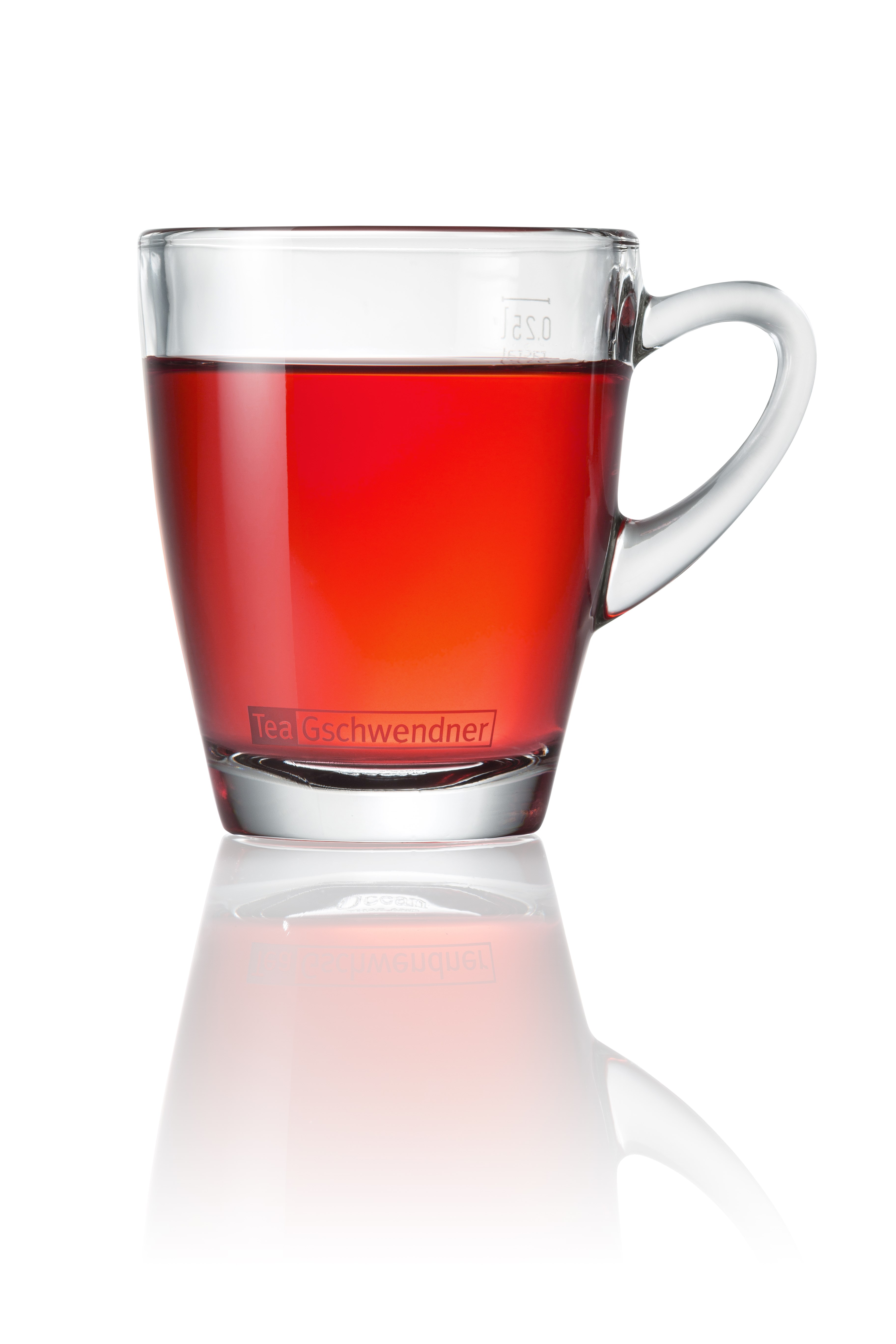 Glass of bright red Früchteparadies fruit tea with flavours of ripe strawberry, sweet apricot and refreshing acidity
