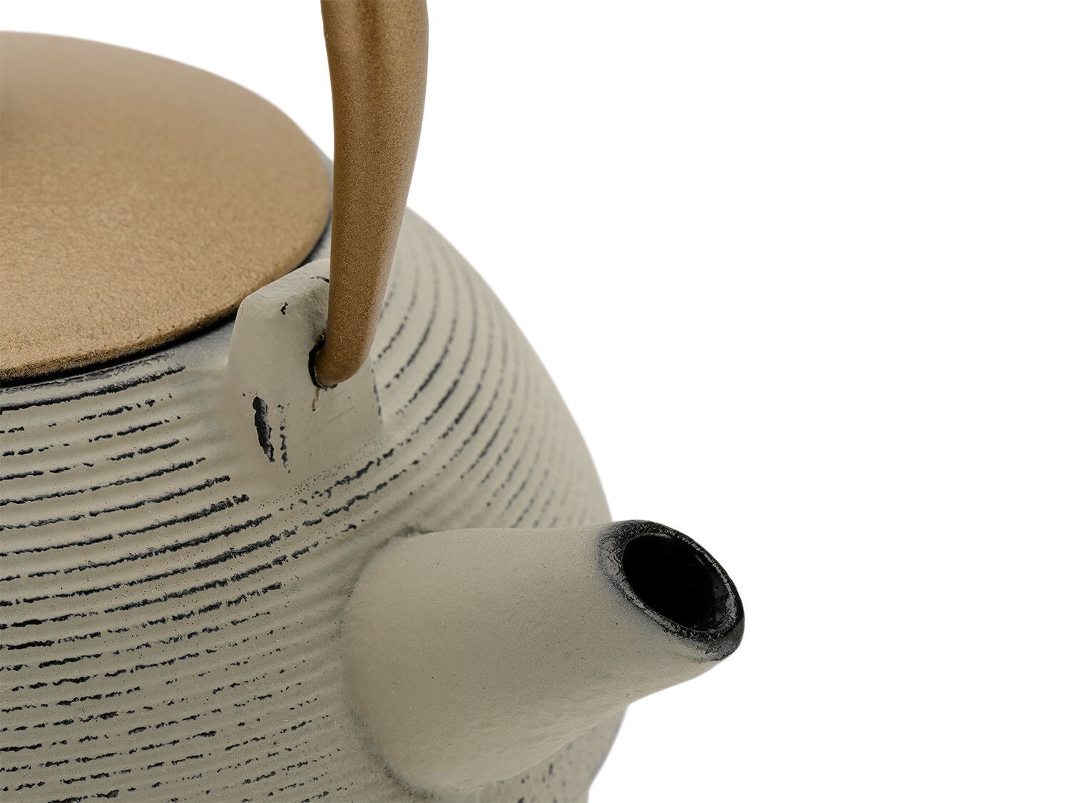 Close-up of grey cast iron teapot with brown handle and lid