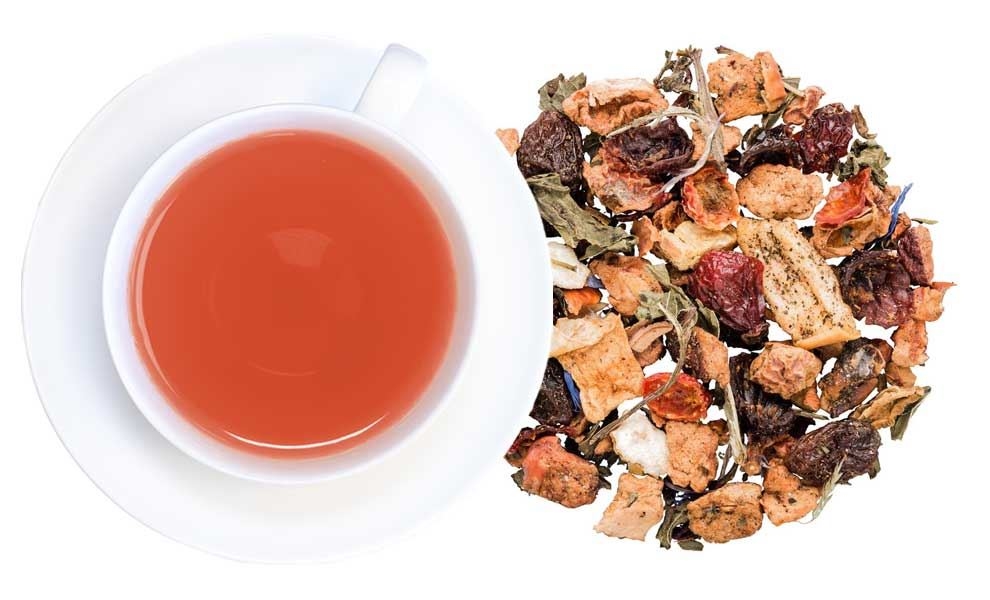 Weiße Tasse mit rotem Früchtetee und losem Tee, tee, Kräutertee, Haupteigenschaften?, Kupfer?