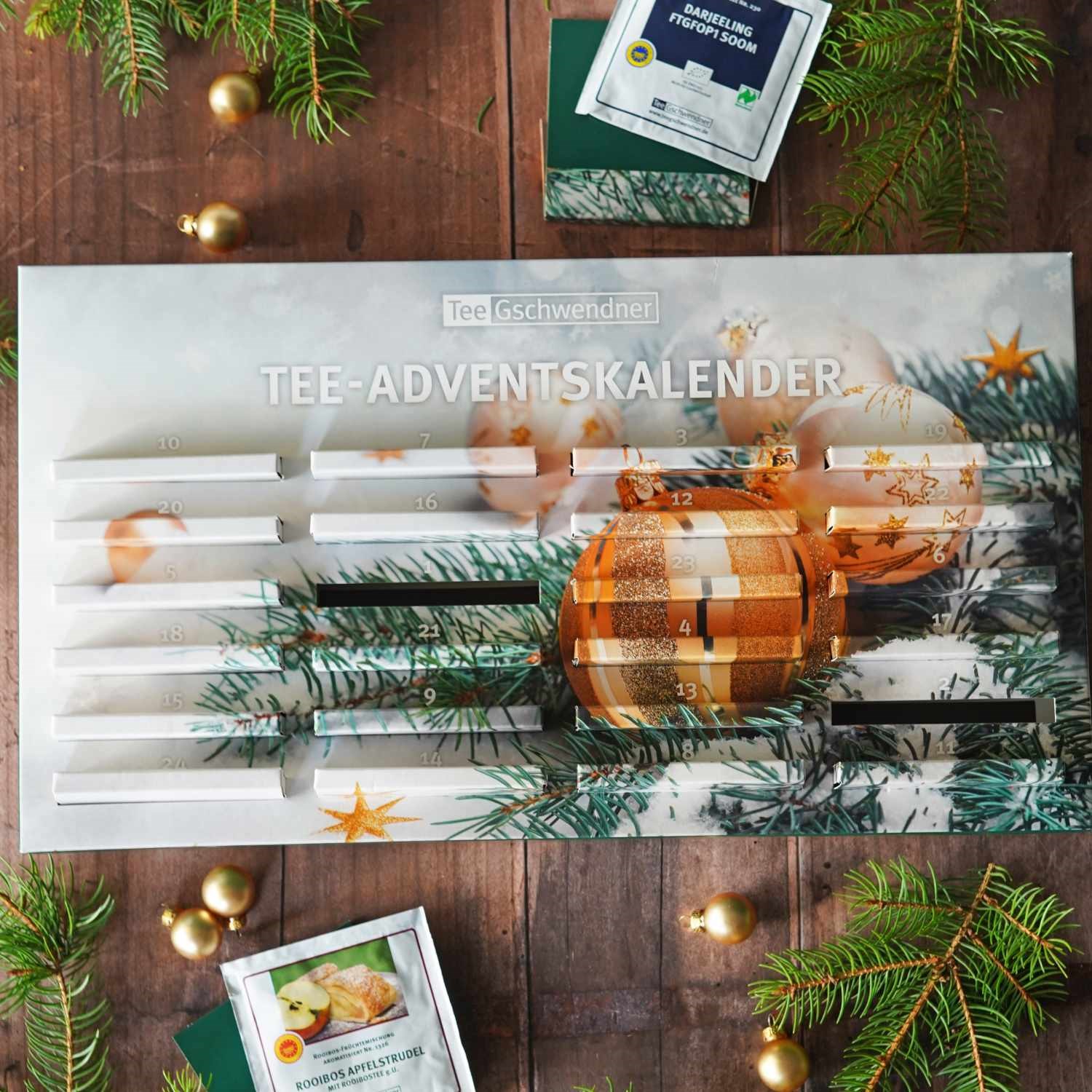 Eleganter Tee-Adventskalender mit 24 Teesorten, Tee-Adventskalender, Adventskalender, Teekalender, Holzdesign, goldene Akzente, tee-adventskalender, adventskalender, tee, goldne ornamenten, tannenzweige